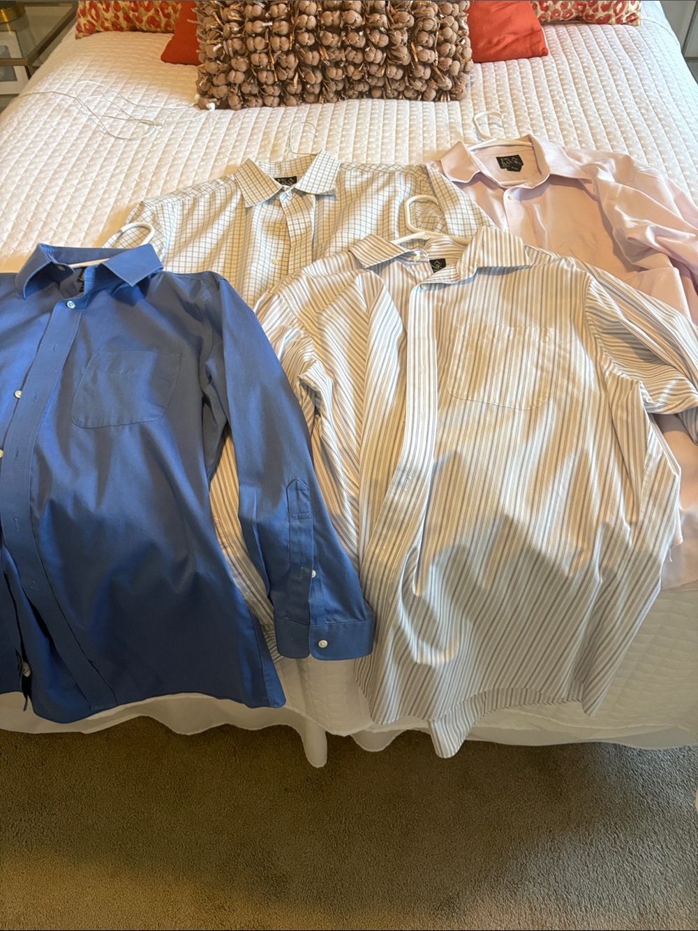 4 Jos A Bank long sleeved button down shirts. Tailored Fit Travelers Collection